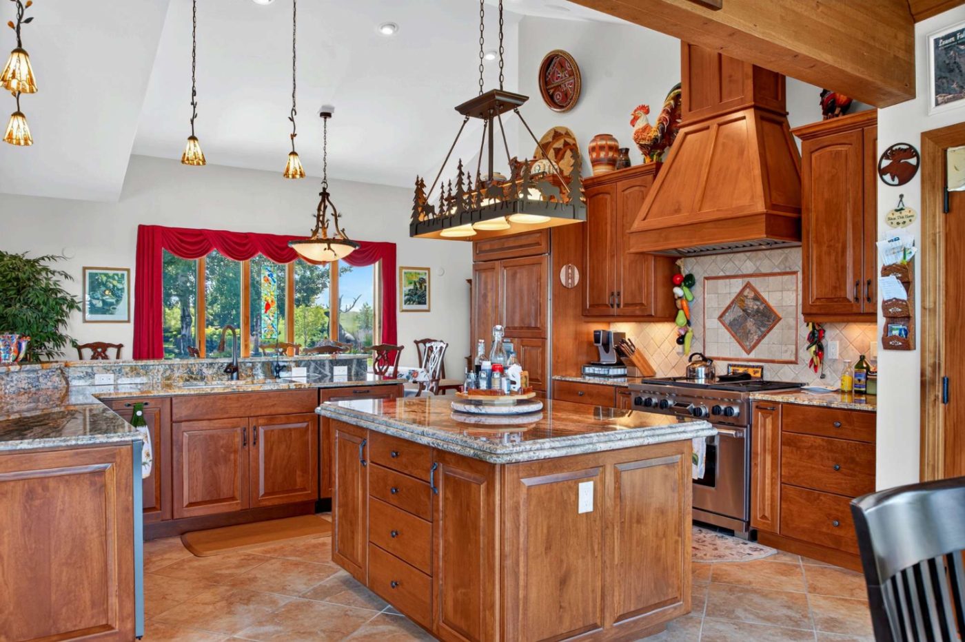 Chef's kitchen with island and butler's pantry