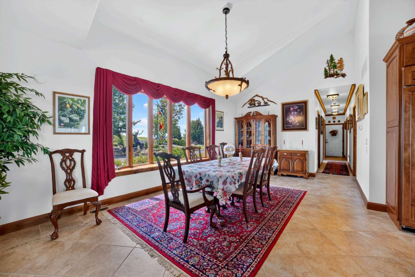 Formal dining room with lake-facing windows