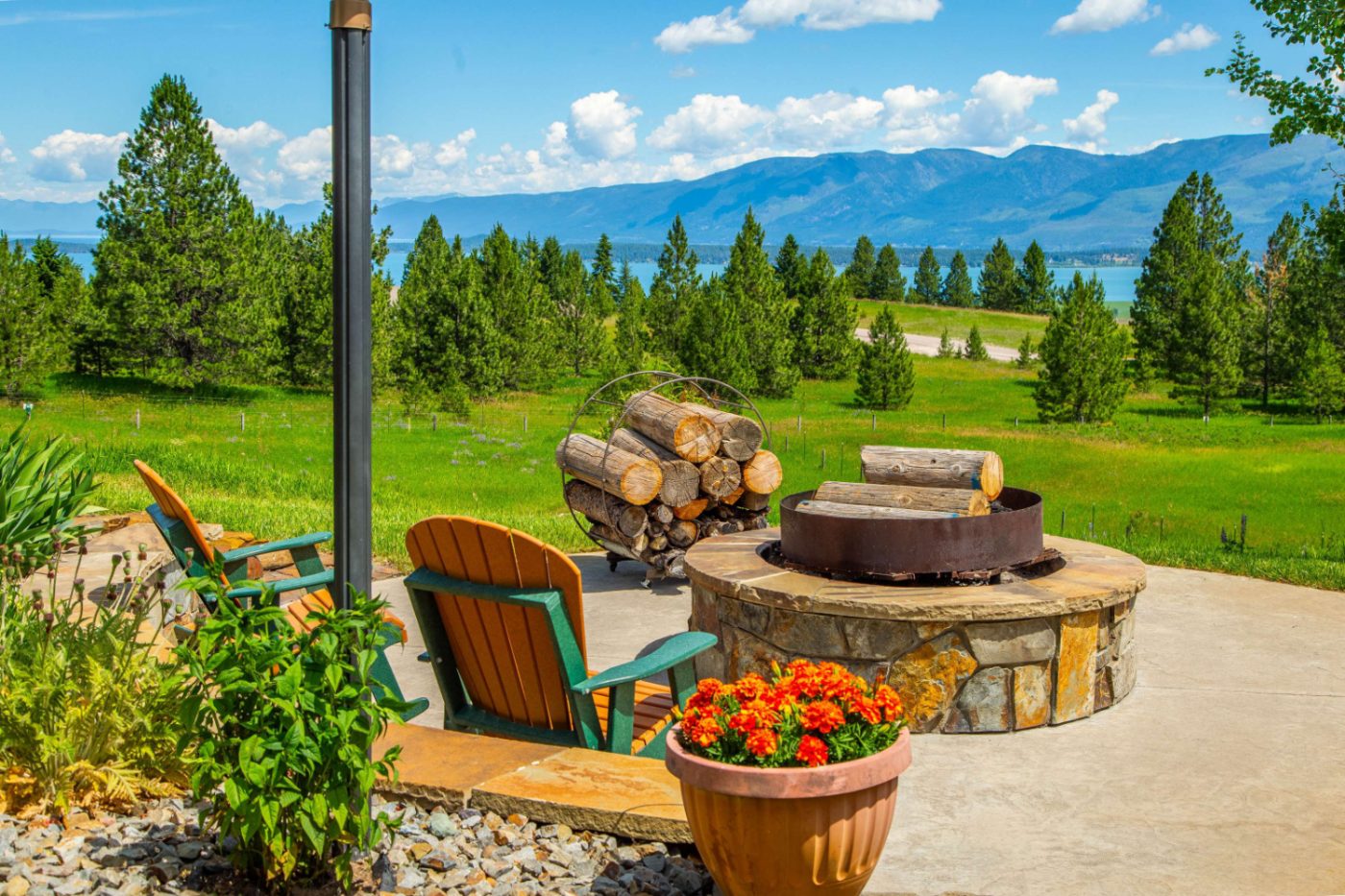 Stone fire pit with valley and lake beyond
